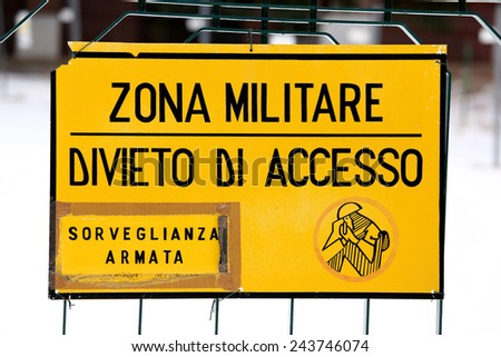 attention military zone sign off from a military base in europe