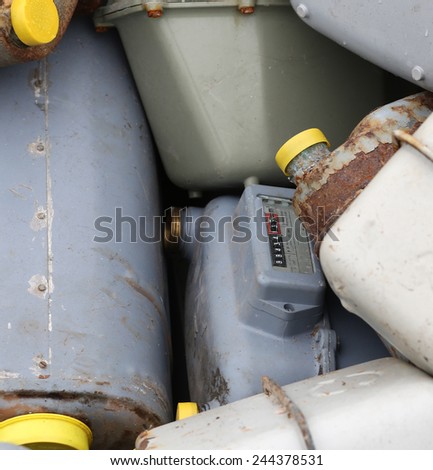 old obsolete gas meters in a landfill of toxic waste special
