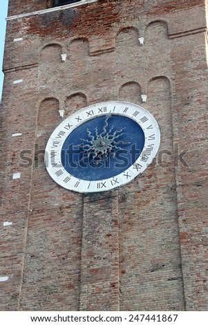 bell tower with  large clock with Roman numerals and a single hour hand