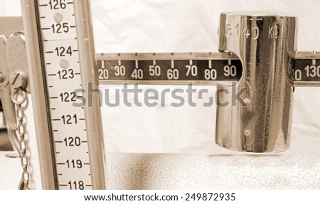 meter to measure the weight and height of patients
