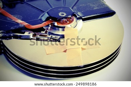 broken hard drives with a band-aid