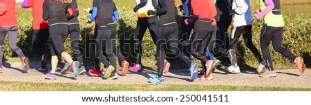 young women during the cross-country race in public park