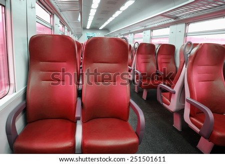 red train seat completely empty during the trip