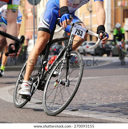 Vicenza, italy - april 12, 2015 bikers run fast on racing bikes during cycle road race