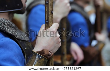 medieval reenactment with costumed characters and ancient clothes