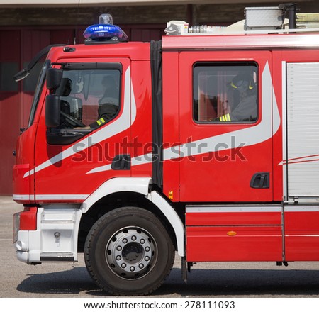 new red fire trucks with sirens blue ready for emergency