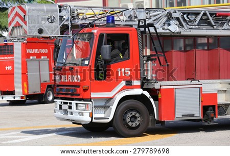 big truck with metal scale of firefighters in the Firehouse