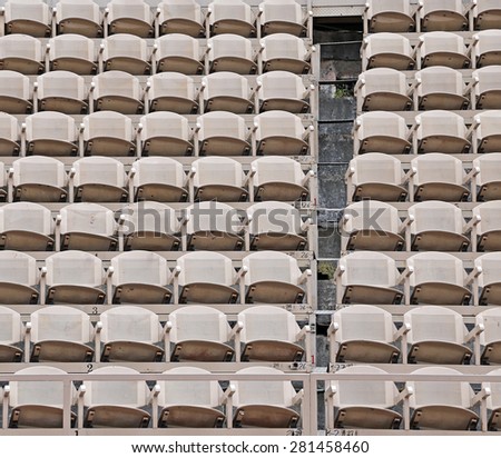 many empty seats in the stands before the sporting event