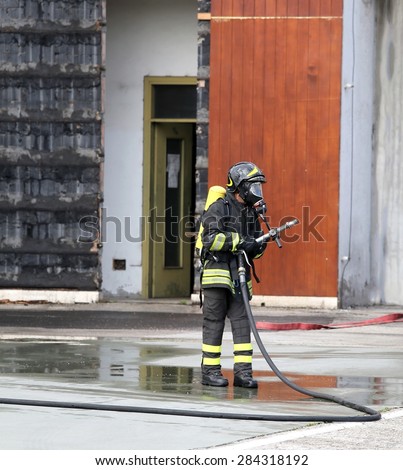 fireman with breathing apparatus during the exercise in fire station