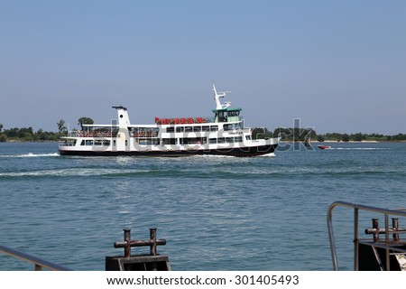 Venice, VE - Italy. 14th July, 2015: Huge Motor Ship of ACTV Italian Company to transport tourists in the basin of san marco in Venice