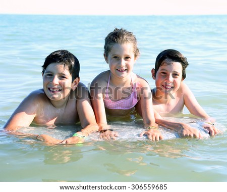 three brothers in the middle of the sea with the surf Tablet