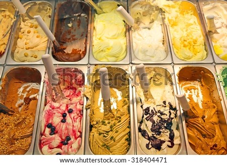 bar with many flavors of delicious ice cream for sale in summer