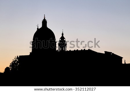 silhouette of the SUPERGA Cathedral near the city of Turin in Italy at sunset