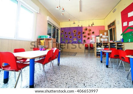inside of the kindergarten classroom with drawings on the walls