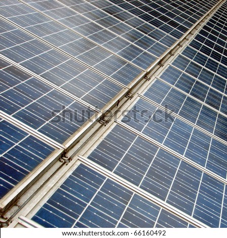 long line of solar panels to produce clean electricity
