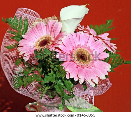 bouquet of flowers for an anniversary with pink gerberas and a calla