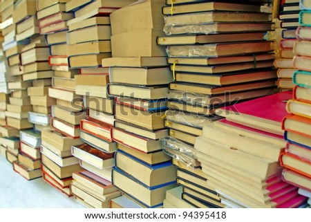 pile of old books for sale to the market