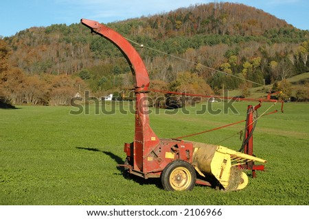 Piece of farm machinery in a field on a clear fall day in Vermont