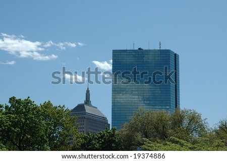 Two skyscrapers in Boston against a blue summer sky