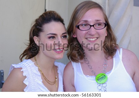 SAN FRANCISCO-MARCH 23: Broadway musical actress Neka Zang (left) greets a fan at the stage door of Wicked at the Orpheum Theater March 23, 2010 in San Francisco, California