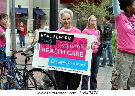 MINNEAPOLIS - SEPTEMBER 12: An advocate for Health Care Reform protests outside of Barack Obama\'s Health Care Reform speech at the Target Center on September 12, 2009 in Minneapolis.