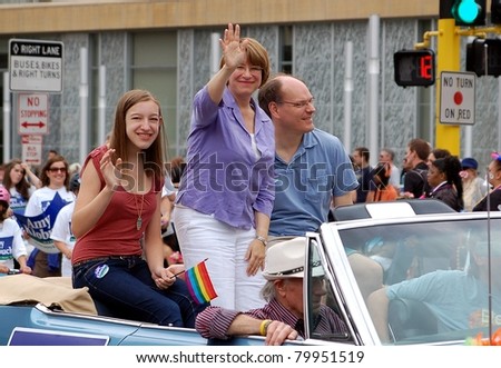MINNEAPOLIS - JUNE 26:  United States Senator Any Klobuchar waves to the crowd in the Twin Cities Gay Pride Parade on June 26, 2011 in Minneapolis, Minnesota.