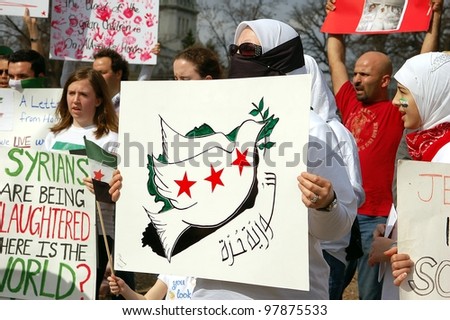 MINNEAPOLIS - MARCH 17:   An Unidentified Participant at a global demonstration to mark the first year of the Syrian Revolution, on March 17, 2102 in Minneapolis.