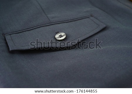 pant back pocket with button