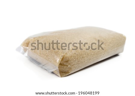 Plastic Bag of Sugar Isolated on White