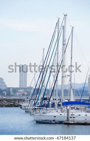 Yachts docked at the harbor in Pattaya, Thailand