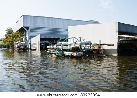 BANGKOK - NOV. 25: Factories damaged at Nava Nakorn Industrial, which is flooded for a period of 1 month on November 25, 2011 at Nava Nakorn Industrial Pathum Thani in Bangkok.