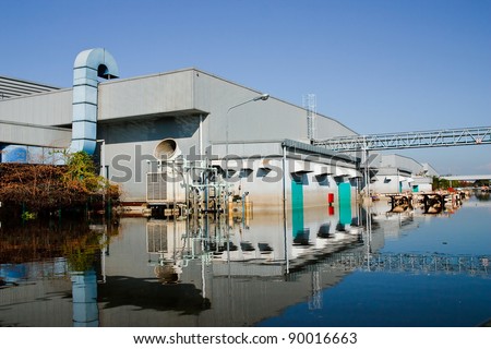 BANGKOK - NOV. 25: Factories damaged at Nava Nakorn Industrial, which is flooded for a period of 1 month on November 25, 2011 at Nava Nakorn Industrial Pathum Thani, in Bangkok.