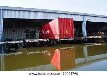 BANGKOK - NOV. 28: Factories damaged at Nava Nakorn Industrial, which is flooded for a period of 1 month on November 28, 2011 at Nava Nakorn Industrial Pathum Thani, in Bangkok.