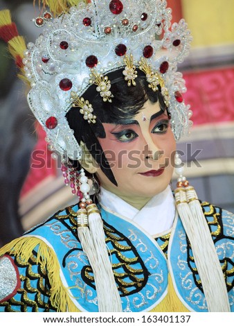 UBON RATCHATHANI, THAILAND  NOV 4, 2013 :  Unidentified woman traditional makeup style of Chinese opera in annual cerebration of Bhuda Khong shrine on Nov 4, 2013 in Ubon Ratchathani, Thailand.