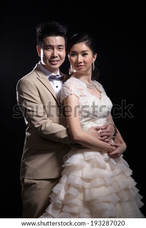 Asian bride and groom wedding photo