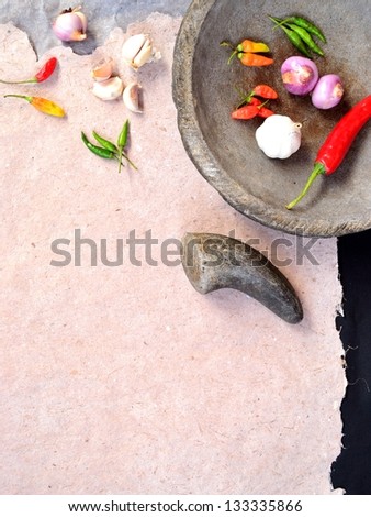 Spices on Indonesian stone mortar.image of Indonesian food culture.