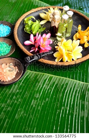 Asian tropical flowers with bath salt.image of flower bath.