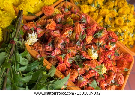 Colorful rose, Marigold flowers for sale to offer to God during worship at little India, Singapore