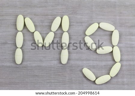 Magnesium tablets in a shape of Mg alphabet, to relieves muscle cramps