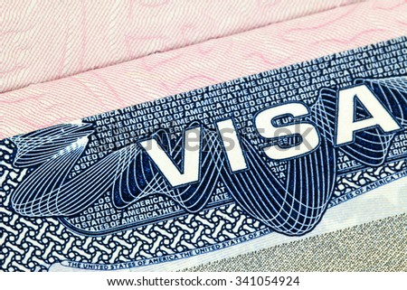 BANGKOK, THAILAND - APRIL 7, 2015 : Closeup of the Visa to The United States of America (USA) focusing on the word VISA in April 7, 2015 in Bangkok, Thailand