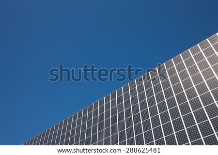 Solar panels installed on the outer wall of commercial buildings