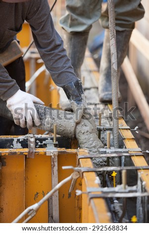 The injection work the concrete to make the foundation of the construction work residential housing