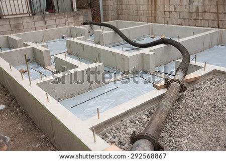 The injection work the concrete to make the foundation of the construction work residential housing