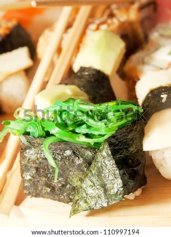 sushi with seaweed around sushi set