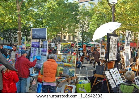 Montmartre - October 31: Place Du Tertre In Montmartre, Paris With Street Artists And Paintings On October 31, 2012. The Area Once Attracted Famous Modern Artists Including Picasso And Dali.