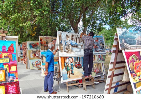 HAVANA - January 27: art market and sellers in Havana, Cuba on January 27, 2009. The street market sells iconic Cuban souvenirs to tourists.