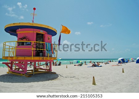 MIAMI - August 24: view of Miami Beach with a pink art deco lifeguard tower in Miami, Florida on August 24, 2011. Twenty nine towers line the beach and are iconic images of Miami Beach.