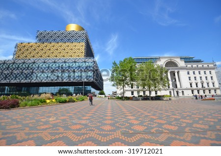 Birmingham - June 24, 2015: view of Centenary Square with the new library and Baskerville House in Birmingham, UK. A major redesign is planned for the public square in 2017.