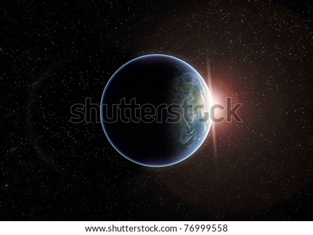 Planet earth isolated in black as viewed from space with massive glowing light flare as the sun rises over the horizon.