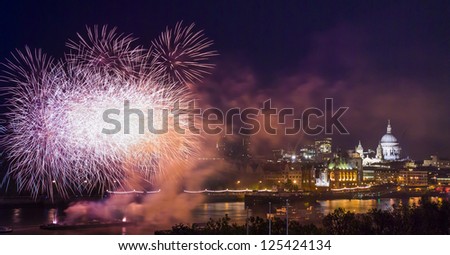 Guy Fawkes night fireworks on Thames River and St Paul's Cathedral in London at night, London, United Kingdom